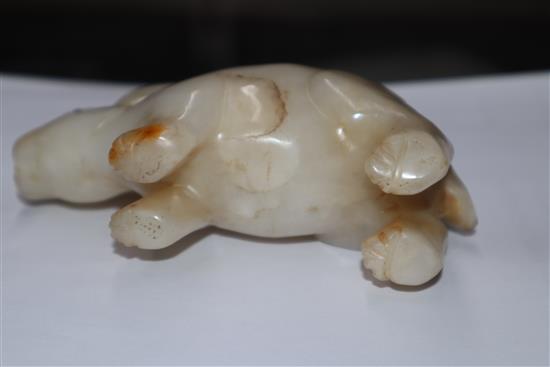 A 19th century Chinese white jade figure of a rabbit, glass inset eyes